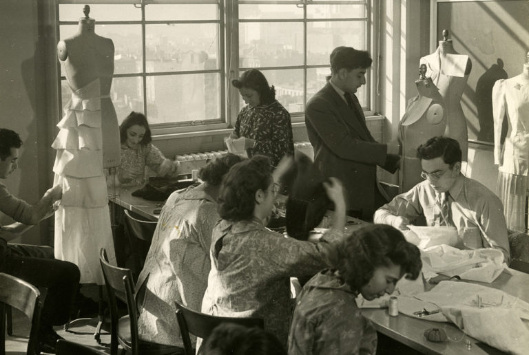 Students draping in classroom circa 1945